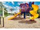 A colorful playground offers endless fun for children in this Gathering-friendly community at 12841 Balsam Ter, Bradenton, FL 34212