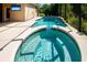 Refreshing pool and spa area with a mounted television, screened-in for year-round enjoyment at 12841 Balsam Ter, Bradenton, FL 34212