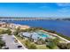 Stunning aerial view of waterfront property with pool, clubhouse and marina at 1294 Riverscape St # D, Bradenton, FL 34208