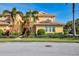 Charming two-story home featuring lush landscaping, sidewalks, and a well-maintained lawn at 1294 Riverscape St # D, Bradenton, FL 34208