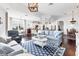 Open-concept living space features a living room, kitchen, and dining area with an elegant design at 1294 Riverscape St # D, Bradenton, FL 34208