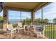 Relaxing screened-in patio with comfortable seating and views of the water at 1294 Riverscape St # D, Bradenton, FL 34208