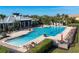 A large community pool featuring a wading area, lap lanes and sun loungers in a well-maintained outdoor space at 1294 Riverscape St # D, Bradenton, FL 34208