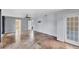 Large bedroom featuring neutral tile floors and access to an ensuite bath and outdoor patio at 1668 Tropicaire Blvd, North Port, FL 34286