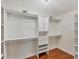 Bright, open walk-in closet with custom shelving and storage solutions at 1668 Tropicaire Blvd, North Port, FL 34286