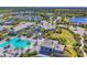 Aerial view of the community clubhouse and pool, showcasing the lush landscaping at 17675 Azul Dr, Lakewood Ranch, FL 34202