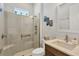 Clean and bright bathroom with glass enclosed shower, modern fixtures, and vanity at 17675 Azul Dr, Lakewood Ranch, FL 34202