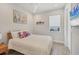 This bedroom is bright and cozy, with natural light and beachy décor at 17675 Azul Dr, Lakewood Ranch, FL 34202