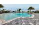 Large pool offers a depth of 1 ft 4 in at entry, surrounded by palm trees at 17675 Azul Dr, Lakewood Ranch, FL 34202