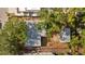 Overhead view of the home showing the roof, large backyard, and surrounding trees at 2110 Euclid Ter, Sarasota, FL 34239