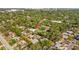 Birds eye shot of the property nestled within a verdant neighborhood with city access at 2110 Euclid Ter, Sarasota, FL 34239