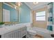Fresh bathroom with a neutral color palette, bath and shower combo, and vanity with storage at 2110 Euclid Ter, Sarasota, FL 34239