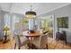 Dining room with tile floors, stylish lighting, and a cozy atmosphere at 2110 Euclid Ter, Sarasota, FL 34239
