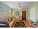 Living room featuring tile floors, a ceiling fan, and lots of light at 2110 Euclid Ter, Sarasota, FL 34239