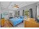 Bright main bedroom with ceiling fan, neutral paint, and tiled floors for a cozy, clean aesthetic at 2110 Euclid Ter, Sarasota, FL 34239