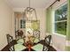 Breakfast nook with a glass table and seating for four, perfect for casual dining at 21221 Wacissa Dr, Venice, FL 34293