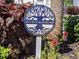Fourth Bayshore sign surrounded by lush landscaping at 2340 Canal Dr # G-35, Bradenton, FL 34207