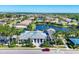 Beautiful Indigo community clubhouse, swimming pool and tennis courts are perfectly situated at 2628 Sapphire Blue Ln, Bradenton, FL 34211