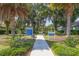 This community park has lush landscaping, established trees, and seating at 2628 Sapphire Blue Ln, Bradenton, FL 34211