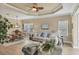 Open-concept living room and dining area featuring hardwood floors and a comfortable design at 2628 Sapphire Blue Ln, Bradenton, FL 34211