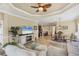 Open-concept living room flowing into kitchen with hardwood floors, ideal for modern living at 2628 Sapphire Blue Ln, Bradenton, FL 34211