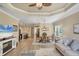 Bright living space flowing into a dining area and kitchen, ideal for entertaining guests at 2628 Sapphire Blue Ln, Bradenton, FL 34211