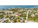 Aerial view highlighting the home's location near the water and residential area at 280 W Cowles St, Englewood, FL 34223