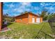 Large backyard with a utility building, offering ample outdoor space and possible pool at 280 W Cowles St, Englewood, FL 34223