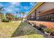 Expansive screened porch provides a comfortable outdoor space to enjoy the lush backyard at 280 W Cowles St, Englewood, FL 34223