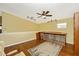 Bright bonus room with built-in storage and hardwood floors at 280 W Cowles St, Englewood, FL 34223