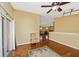 Bright bonus room with hardwood floors and sliding glass door at 280 W Cowles St, Englewood, FL 34223