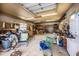 Spacious garage interior offers ample storage and workspace, complete with washer and dryer at 280 W Cowles St, Englewood, FL 34223