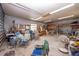 Large garage with shelving, and plenty of room for storage or a workshop at 280 W Cowles St, Englewood, FL 34223