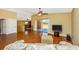 Spacious living room featuring wood floors and a sliding glass door leading to a patio at 280 W Cowles St, Englewood, FL 34223