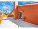 Spacious terrace boasts stucco walls, and a sliding door access the home's interior at 280 W Cowles St, Englewood, FL 34223