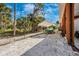 Covered parking with a boat and trailer, secured by a chain-link fence at 280 W Cowles St, Englewood, FL 34223