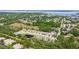 Overhead view of a community near a pond and with nature all around at 2926 River Run Way, Bradenton, FL 34208