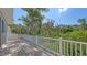 Wood deck surrounded by lush vegetation offering nice view at 2926 River Run Way, Bradenton, FL 34208