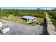 Expansive property with large lot and multiple vehicles at 29527 Maris Dr, Punta Gorda, FL 33982