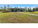 Charming single-story home with a welcoming front porch and spacious yard at 29527 Maris Dr, Punta Gorda, FL 33982