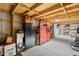 Garage interior with storage cabinets, tool chests, and various tools at 29527 Maris Dr, Punta Gorda, FL 33982