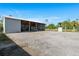 Large open garage space on a spacious lot, ready to store vehicles and equipment at 29527 Maris Dr, Punta Gorda, FL 33982