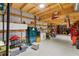 Spacious garage interior showcasing storage cabinets, safe, and various equipment at 29527 Maris Dr, Punta Gorda, FL 33982
