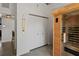 Hallway view featuring a storage closet and access to adjoining rooms, highlighting the layout of the home at 29527 Maris Dr, Punta Gorda, FL 33982
