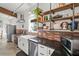 Well-appointed kitchen featuring granite countertops, stainless appliances, and ample storage space at 29527 Maris Dr, Punta Gorda, FL 33982