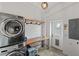 Functional laundry room featuring a washer, dryer, sink, and access to the backyard at 29527 Maris Dr, Punta Gorda, FL 33982