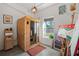 Bright room featuring a traditional sauna, natural light from the window, and unique decorative artwork at 29527 Maris Dr, Punta Gorda, FL 33982