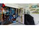 Open view of carport storage with beach-themed decor and shelving that provides ample room for tools at 3112 Cambridge Ave # 6, Bradenton, FL 34207