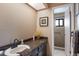 Bathroom features a sink vanity and a walk-in shower at 3123 40Th W Ave, Bradenton, FL 34205
