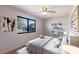 Well-lit bedroom with a large window and modern decor at 3123 40Th W Ave, Bradenton, FL 34205